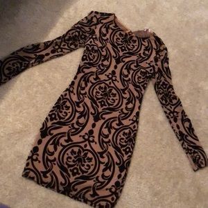 Long sleeved nude/ black party dress